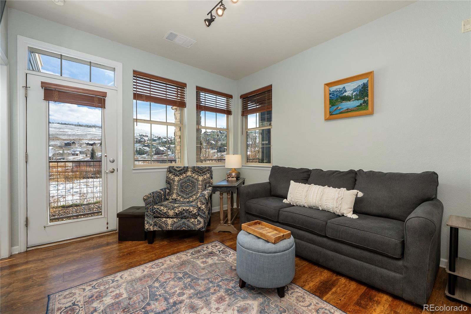 154 Village Road, Unit C103 Granby, CO 80446 - Photo 15 of 39 a living room with furniture and a large window
