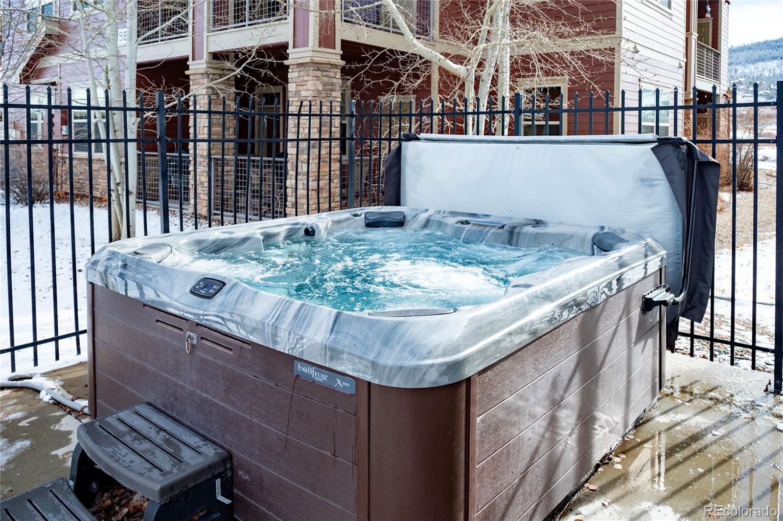 154 Village Road, Unit C103 Granby, CO 80446 - Photo 21 of 39 a view of a house with a wooden deck