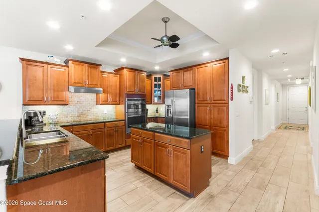 a view of a living room and a wooden floor