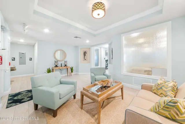 a view of a swimming pool with a lounge chairs