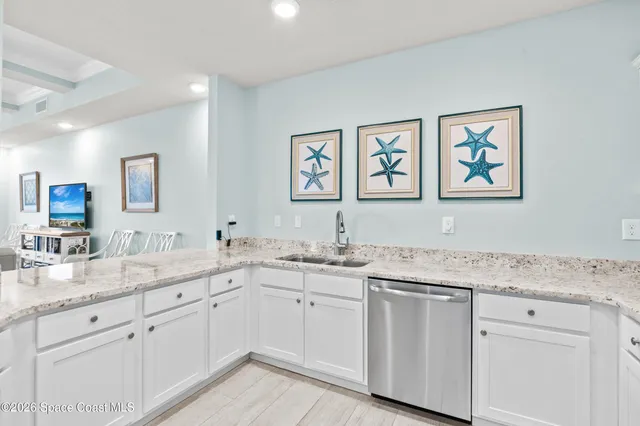 a view of a yard with an ocean view