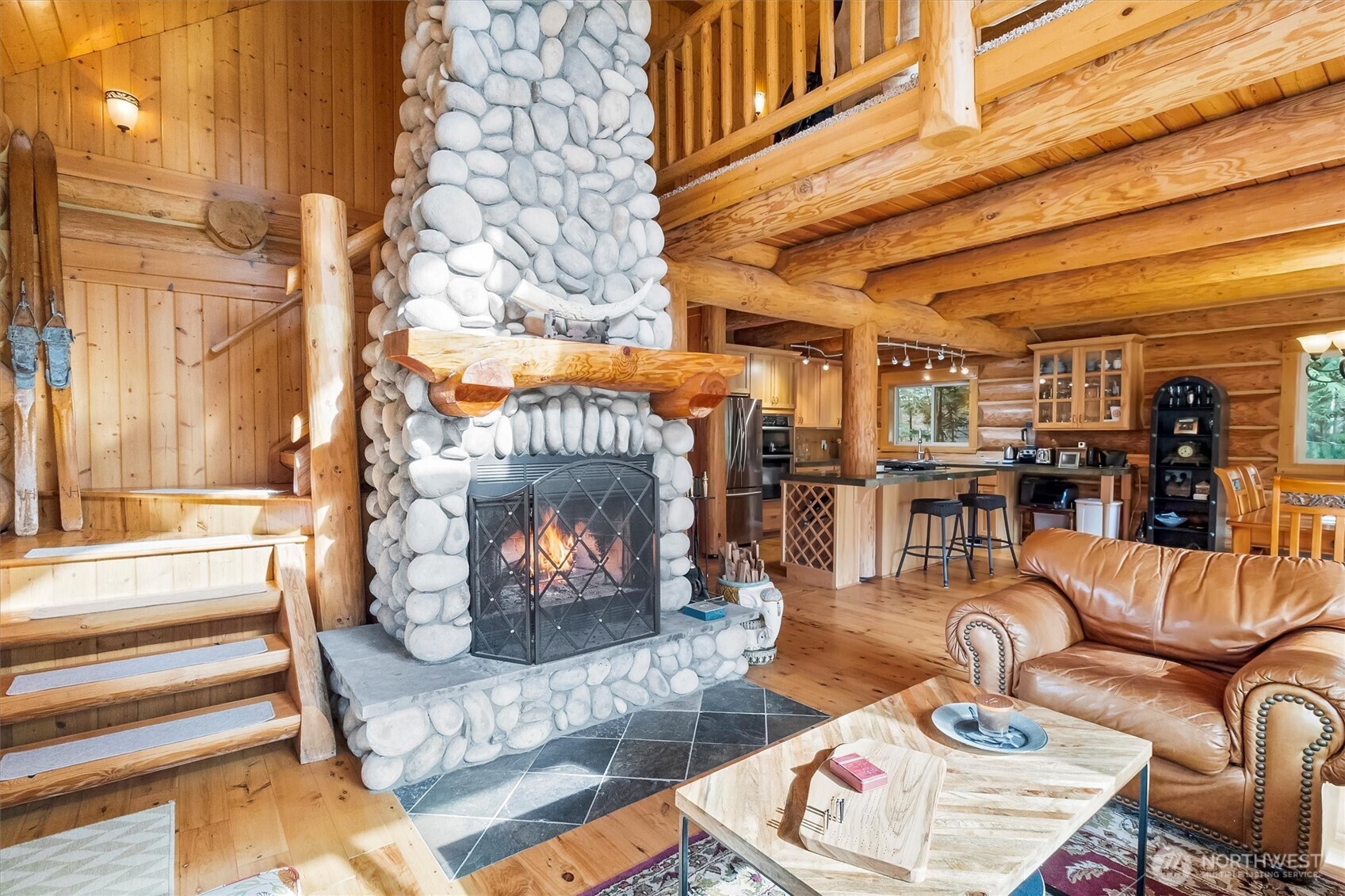 19040 Glacier Rim Drive Glacier, WA 98244 - Photo 12 of 40 a living room with furniture and a fireplace