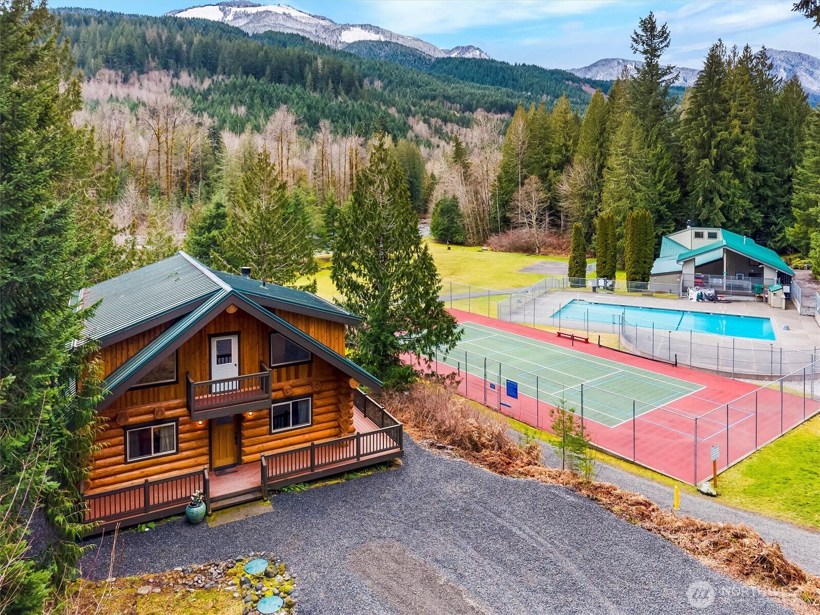 19040 Glacier Rim Drive Glacier, WA 98244 - Photo 28 of 40 an aerial view of a house with swimming pool and a yard