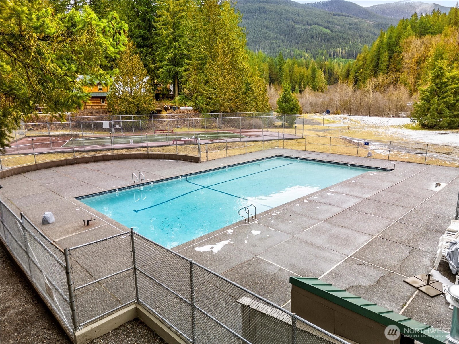 19040 Glacier Rim Drive Glacier, WA 98244 - Photo 35 of 40 a view of a swimming pool with an outdoor seating