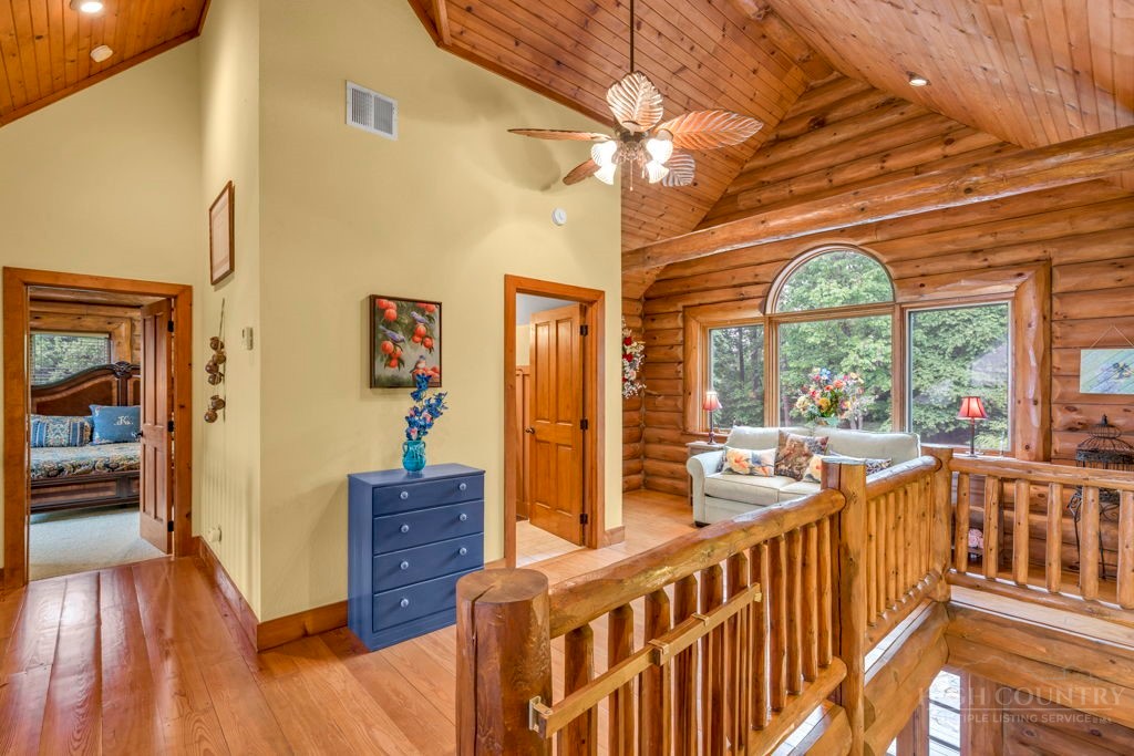 160 Outback Road Ferguson, NC 28624 - Photo 27 of 49 a view of a hardwood & floor to ceiling window