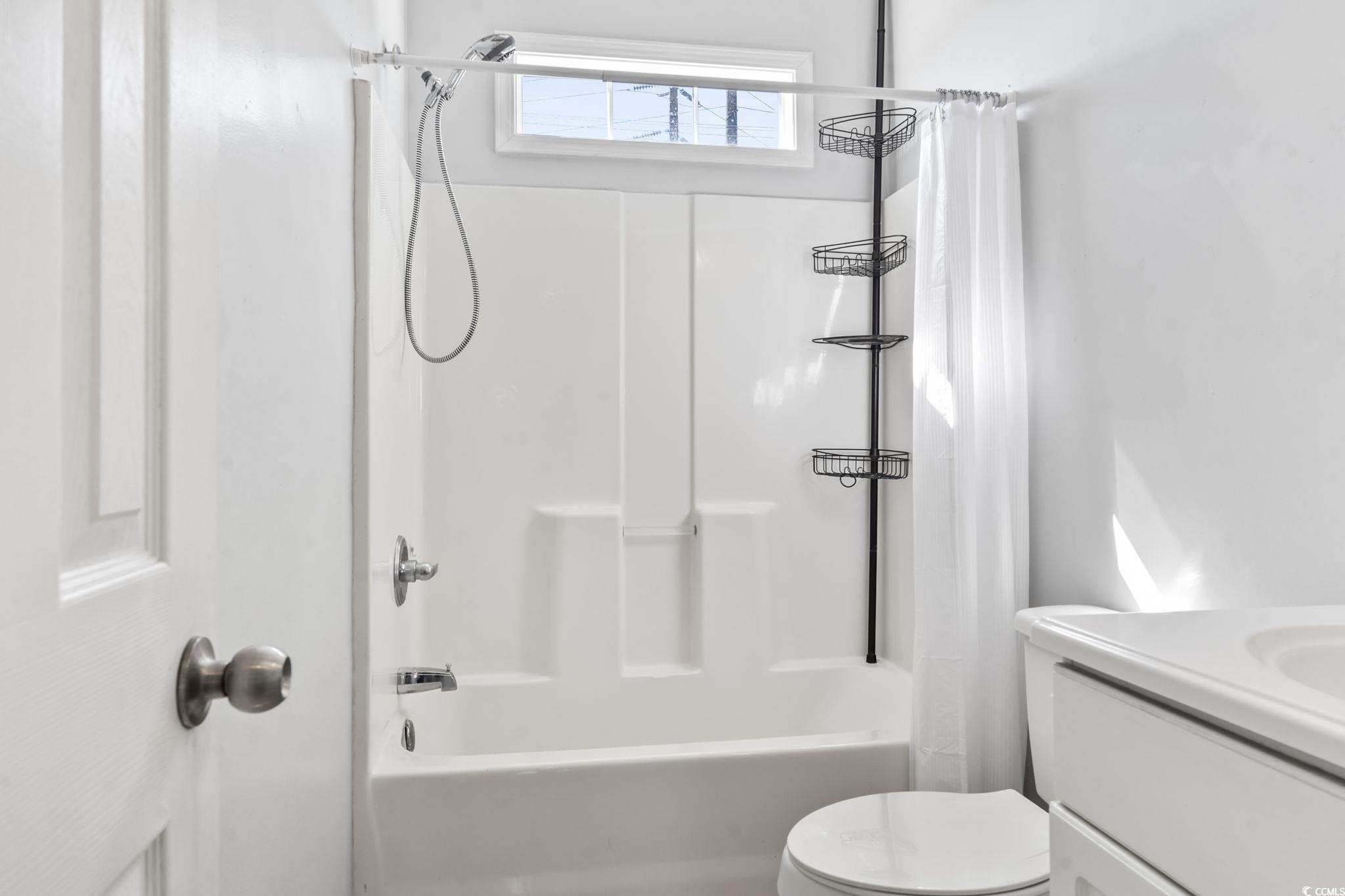 191 Addison Cottage Way Murrells Inlet, SC 29576 - Photo 17 of 28 Bathroom with vanity and shower / tub combo with curtain
