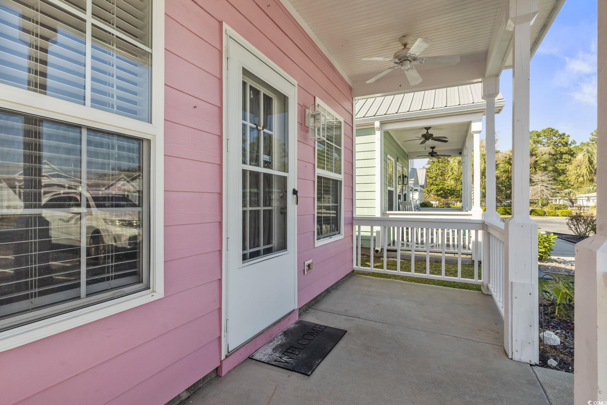 191 Addison Cottage Way Murrells Inlet, SC 29576 - Photo 23 of 28 Doorway to property with a porch and a ceiling fan