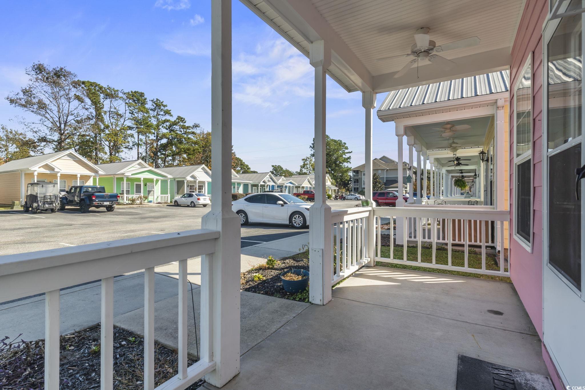 191 Addison Cottage Way Murrells Inlet, SC 29576 - Photo 24 of 28 Porch featuring a residential view and a ceiling fan