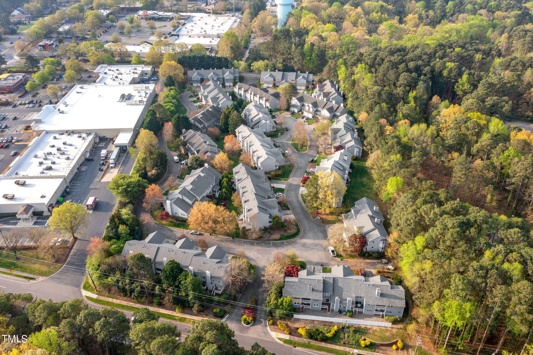 8241 Hempshire Place, Unit 102 Raleigh, NC 27613 - Photo 24 of 30 an aerial view of multiple house