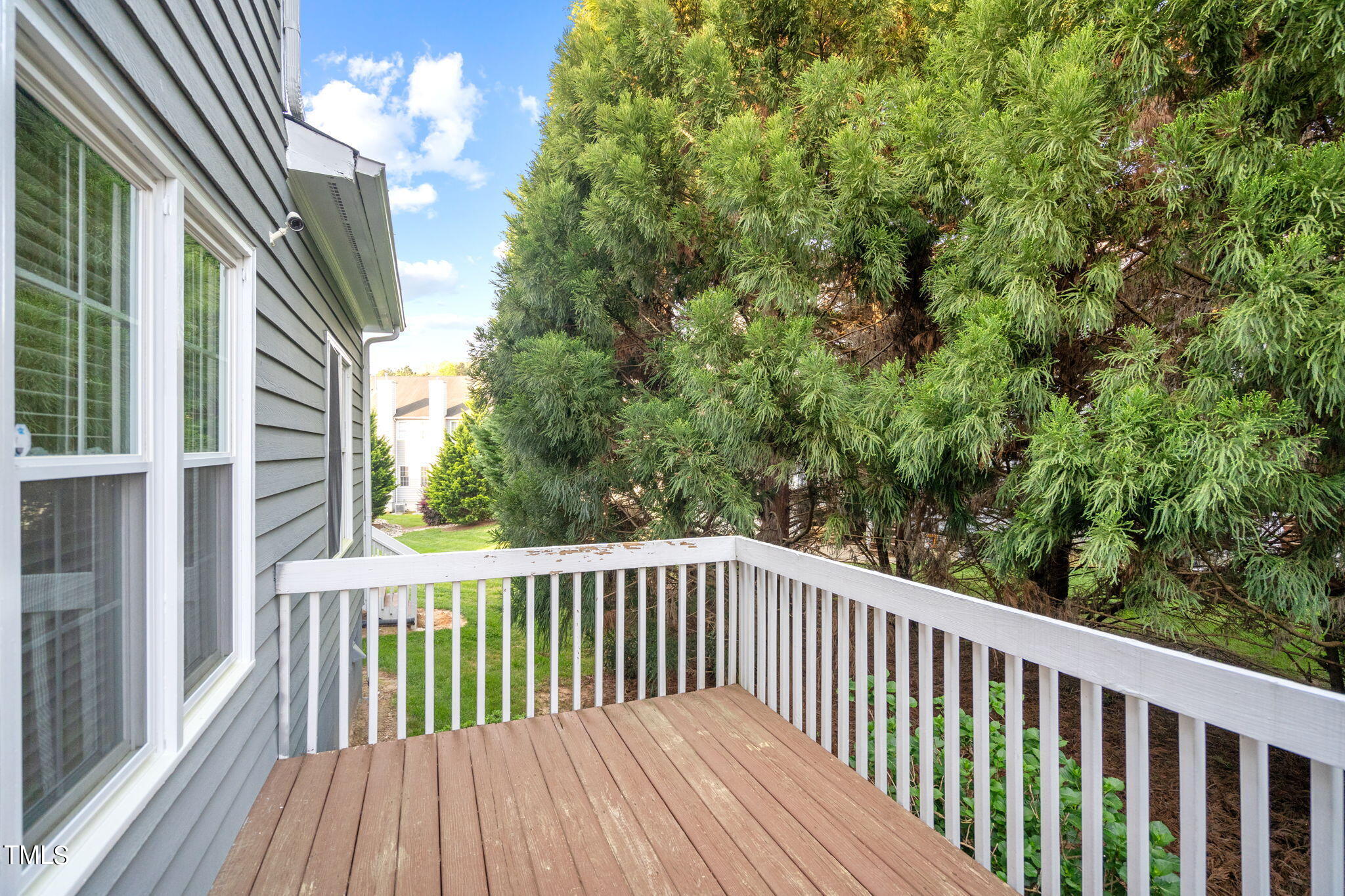 8241 Hempshire Place, Unit 102 Raleigh, NC 27613 - Photo 27 of 30 a view of a wooden fence and floor