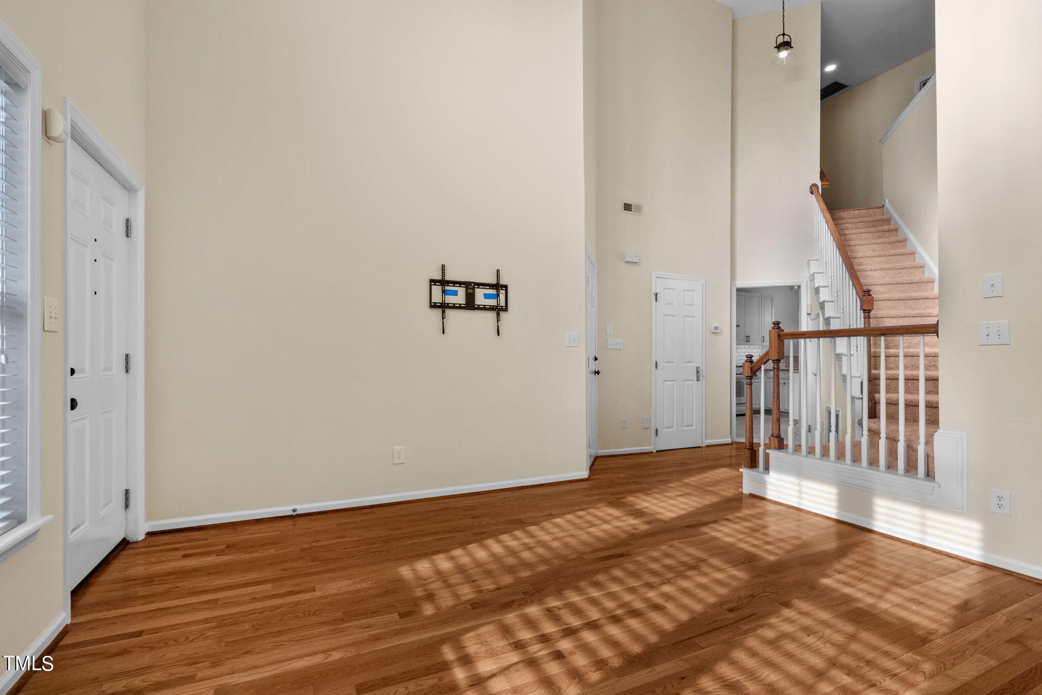 8241 Hempshire Place, Unit 102 Raleigh, NC 27613 - Photo 7 of 30 a view of a livingroom with a flesh screen