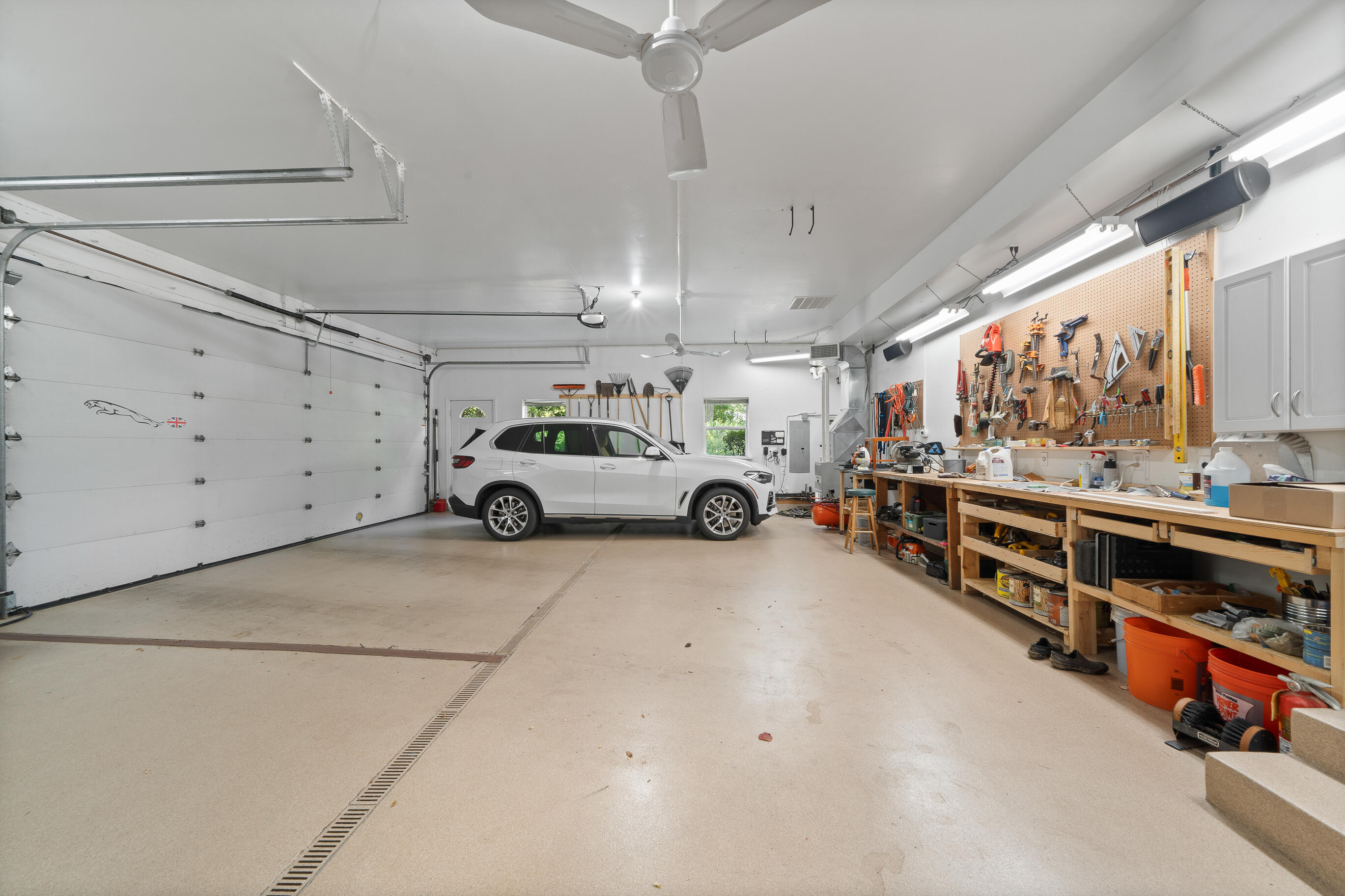 765 Brickley Court Fontana, WI 53125 - Photo 68 of 130 Heated & Air Conditioned Garage