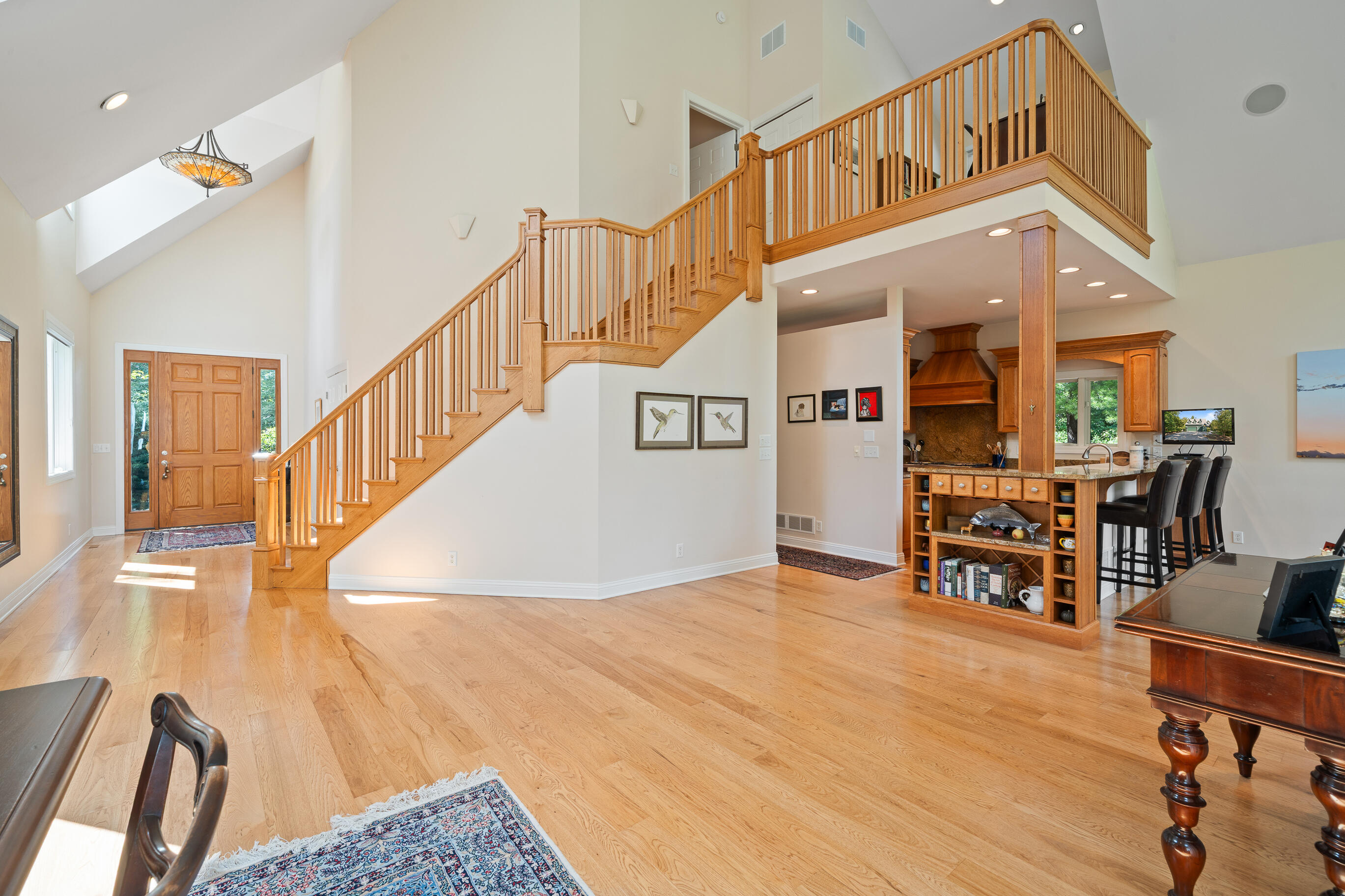 765 Brickley Court Fontana, WI 53125 - Photo 7 of 130 Hardwood Floors throughout