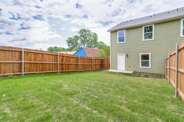 a view of a backyard with a garden