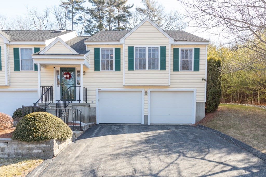 17 D Cold Spring Drive, Unit D Sutton, MA 01590 - Photo 1 of 20 a front view of a house with garden