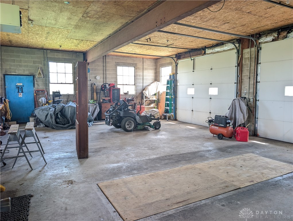 8713 Oakes Road Arcanum, OH 45304 - Photo 6 of 29 This spacious garage offers ample room for vehicles and equipment.
