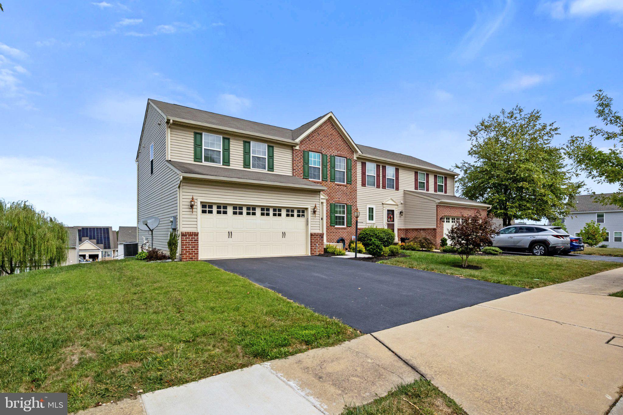 856 Countryside Road Seven Valleys, PA 17360 - Photo 3 of 47 Charming duplex with lush greenery.