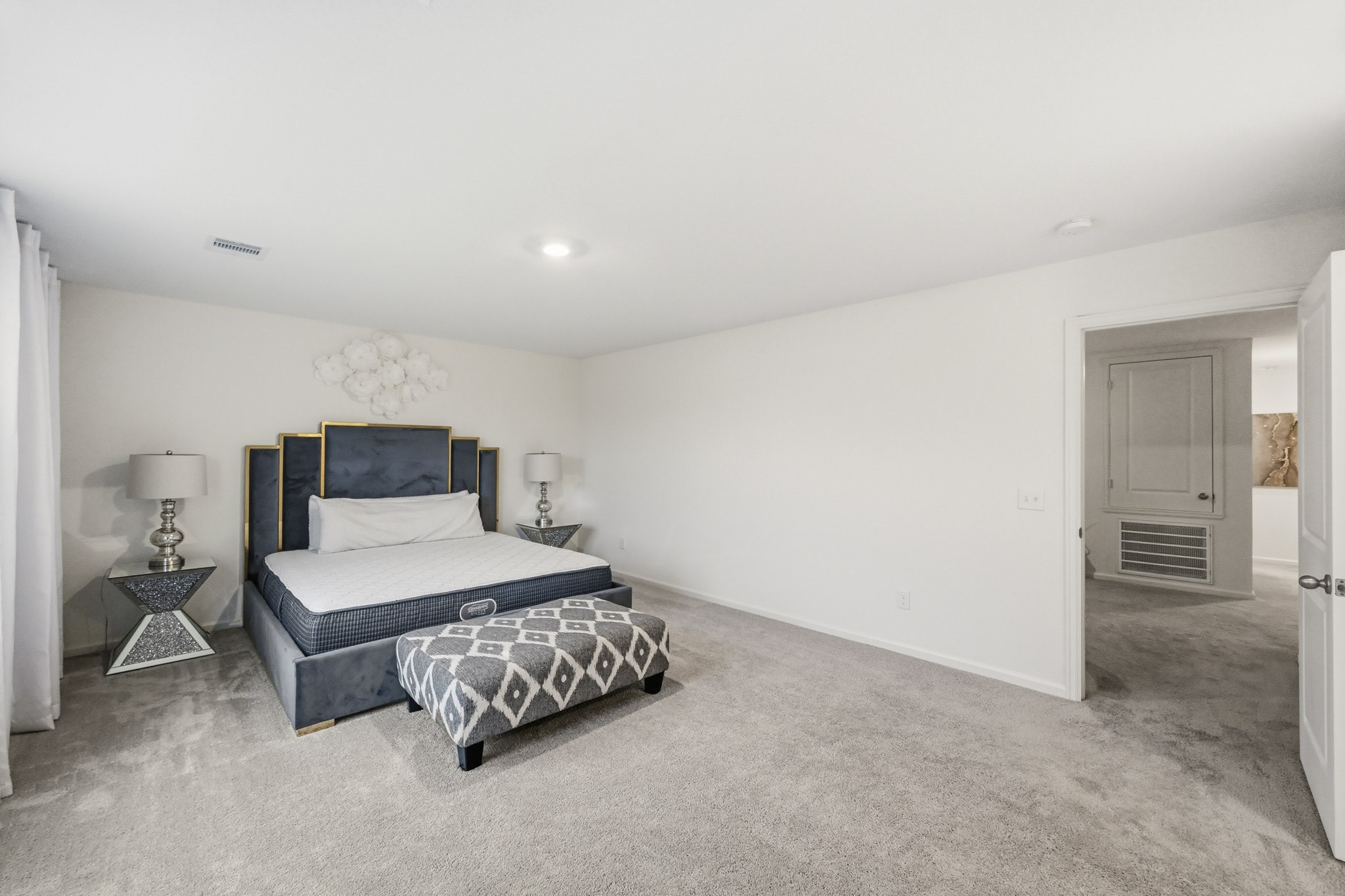7207 Evitale Way Houston, TX 77049 - Photo 29 of 43 a bedroom with a bed and a cabinets