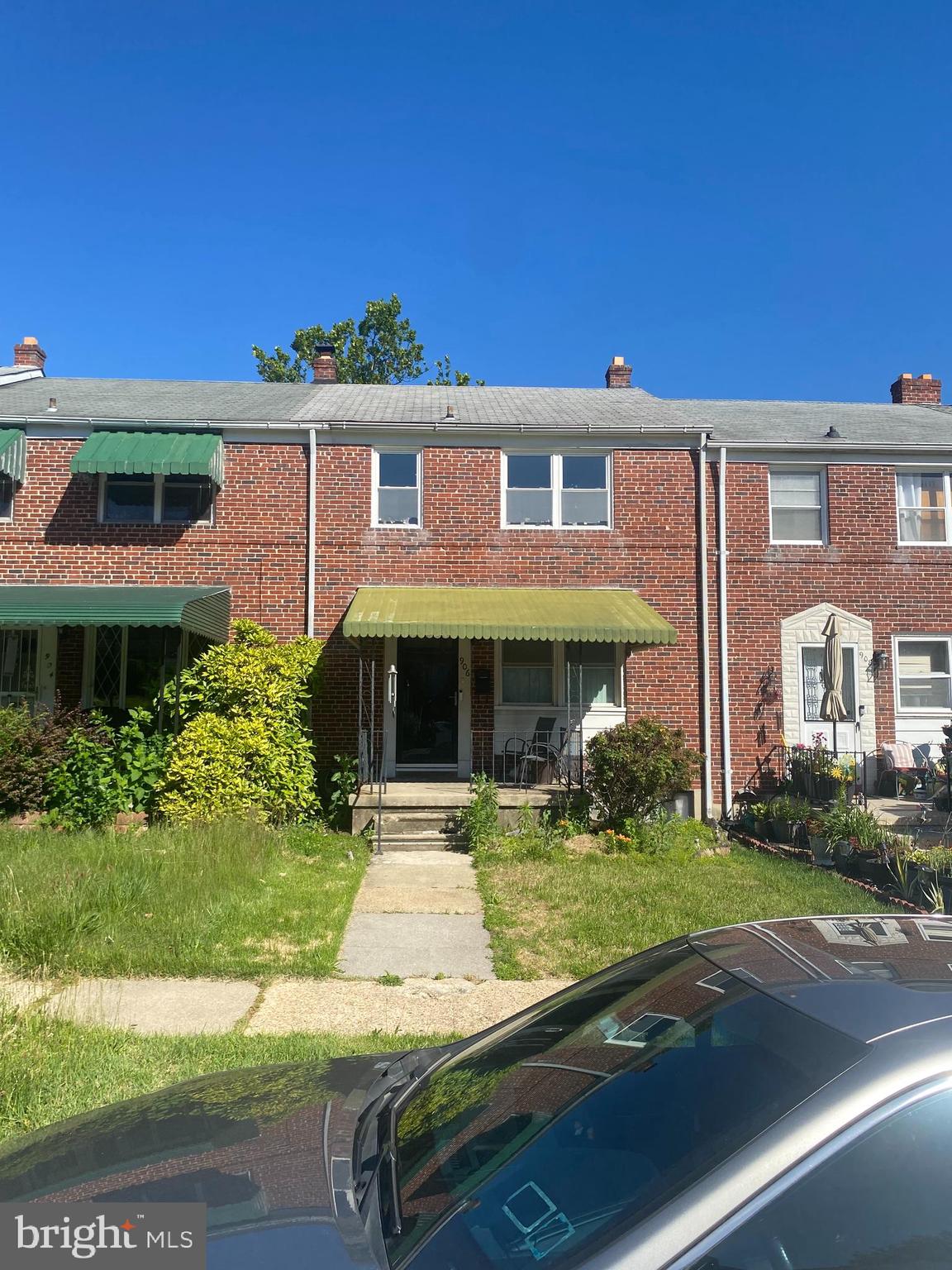 906 Masefield Road Baltimore, MD 21207 - Photo 1 of 22 a front view of a house with garden