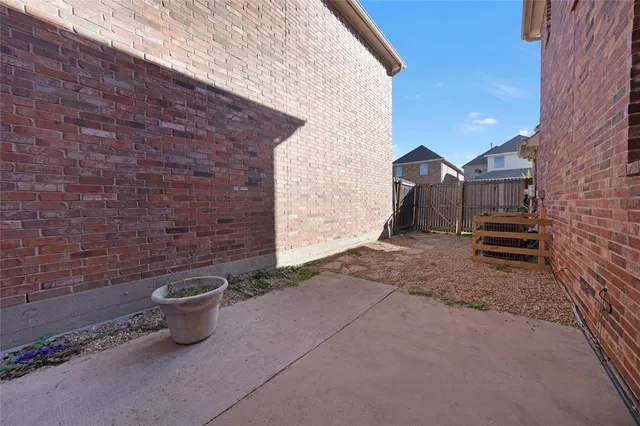 a view of a terrace with a yard