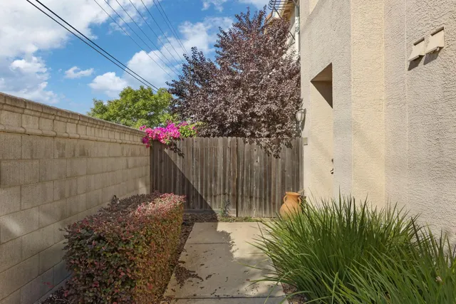 a backyard of a house with lots of green space