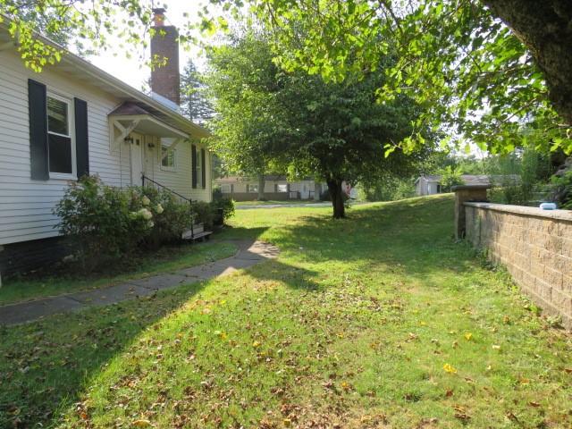 481 Cecil-Henderson Road Cecil, PA 15321 - Photo 4 of 33 a view of a backyard with a garden