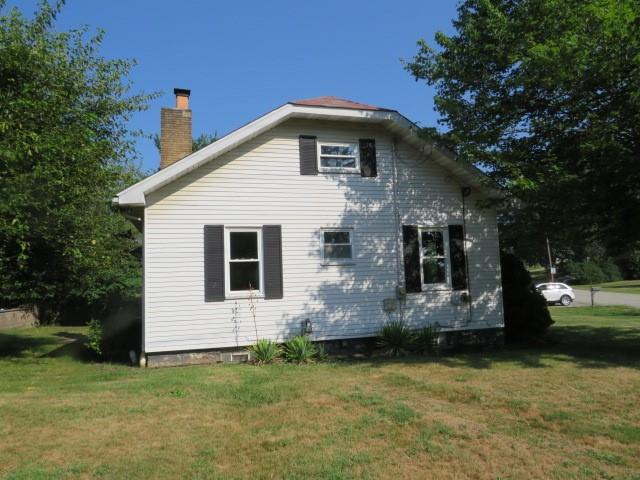 481 Cecil-Henderson Road Cecil, PA 15321 - Photo 6 of 33 a front view of a house with a yard