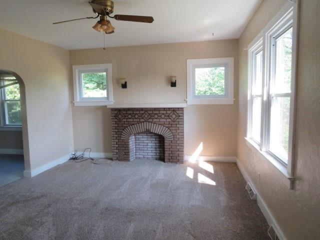 481 Cecil-Henderson Road Cecil, PA 15321 - Photo 8 of 33 a view of an empty room with a window and fireplace