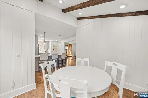 a view of a dining room with furniture