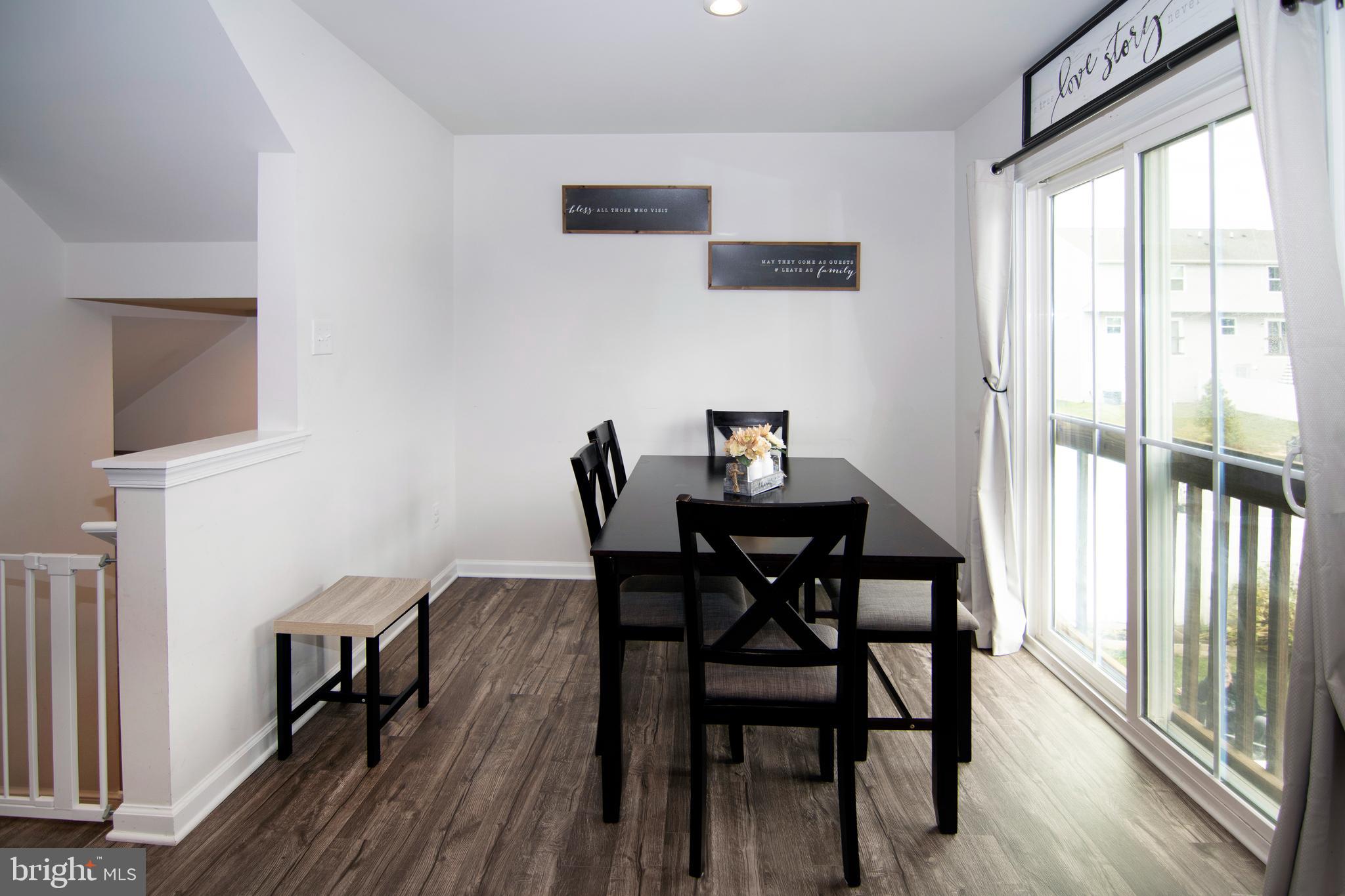 32 Burr Street Williamstown, NJ 08094 - Photo 15 of 34 a view of a dining room with furniture and wooden floor