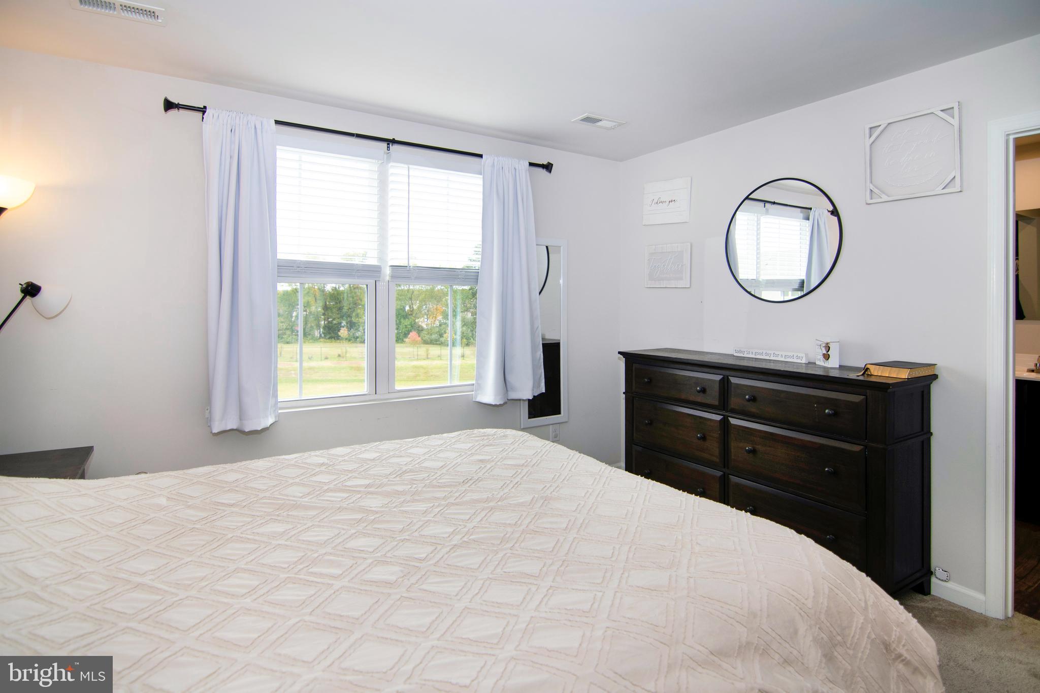 32 Burr Street Williamstown, NJ 08094 - Photo 18 of 34 a bedroom with a bed and a window