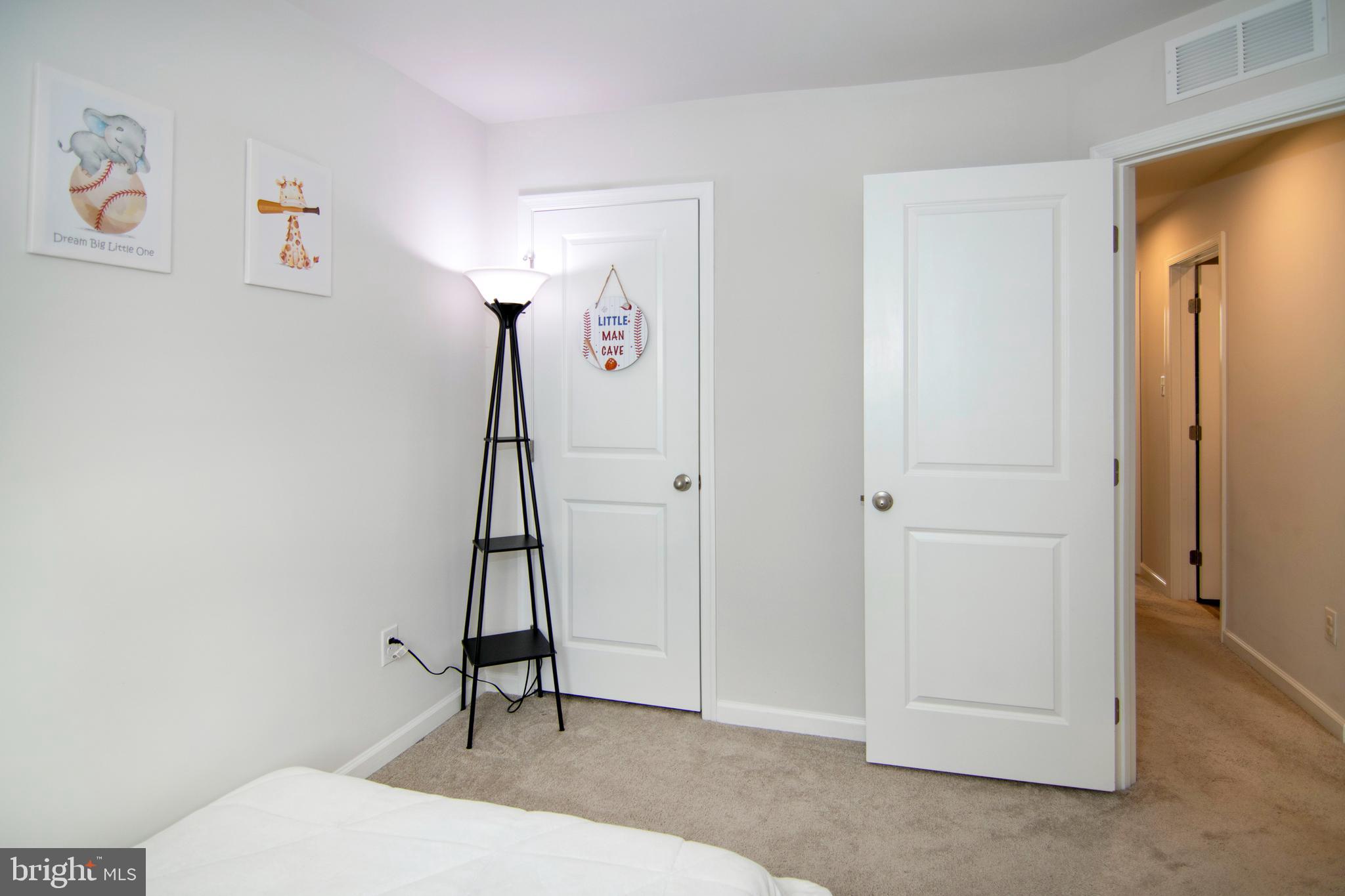 32 Burr Street Williamstown, NJ 08094 - Photo 22 of 34 a room that has a bed and a mirror