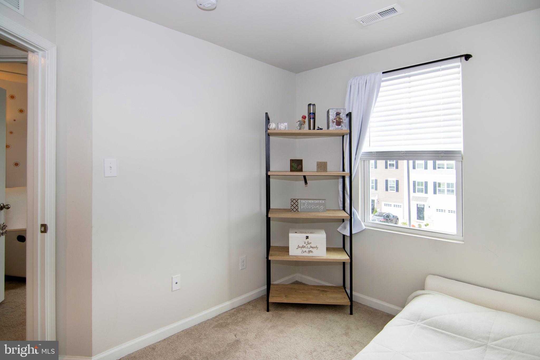 32 Burr Street Williamstown, NJ 08094 - Photo 23 of 34 a living room with furniture and a window