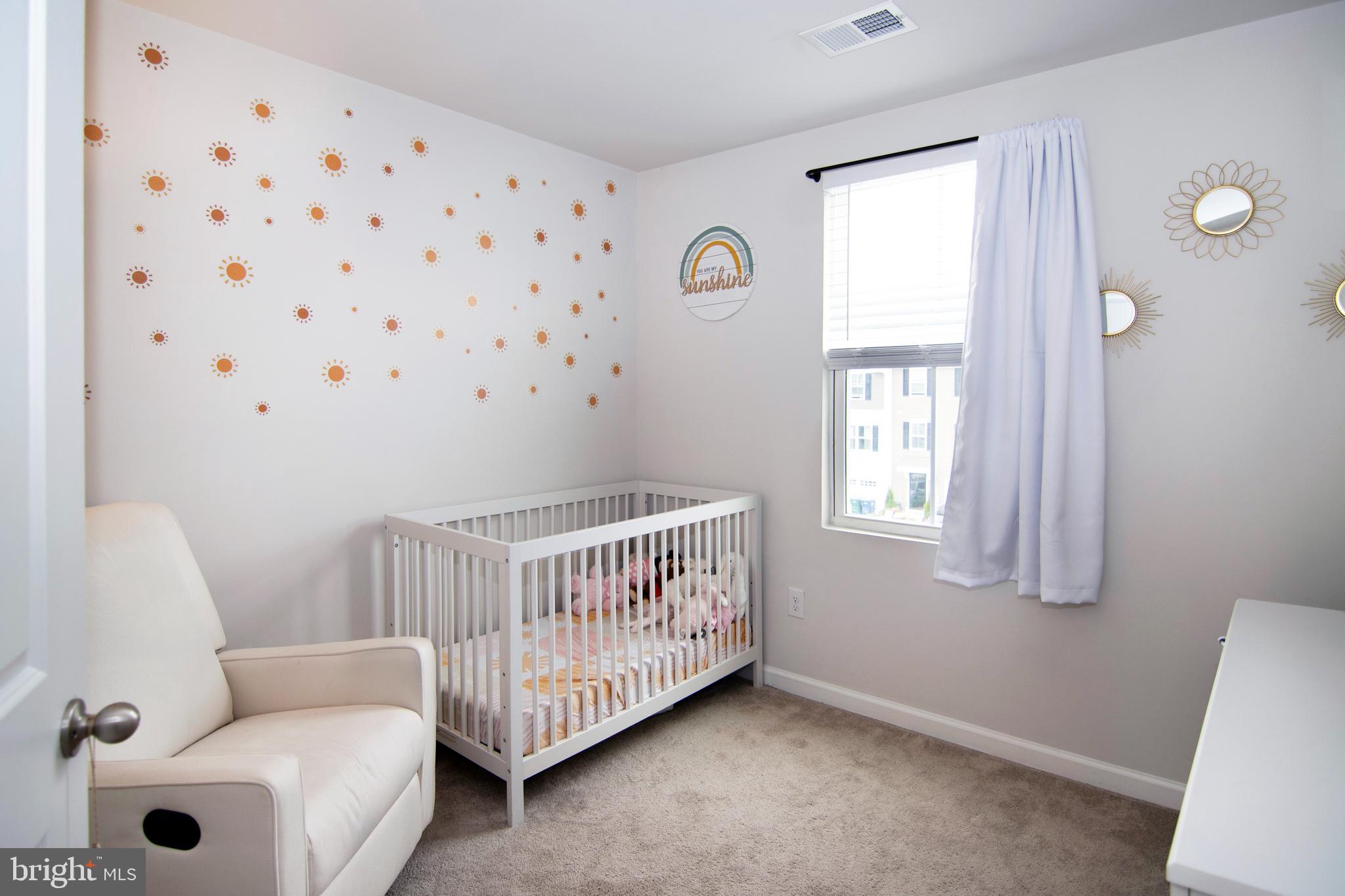 32 Burr Street Williamstown, NJ 08094 - Photo 24 of 34 a bedroom with a bed and window