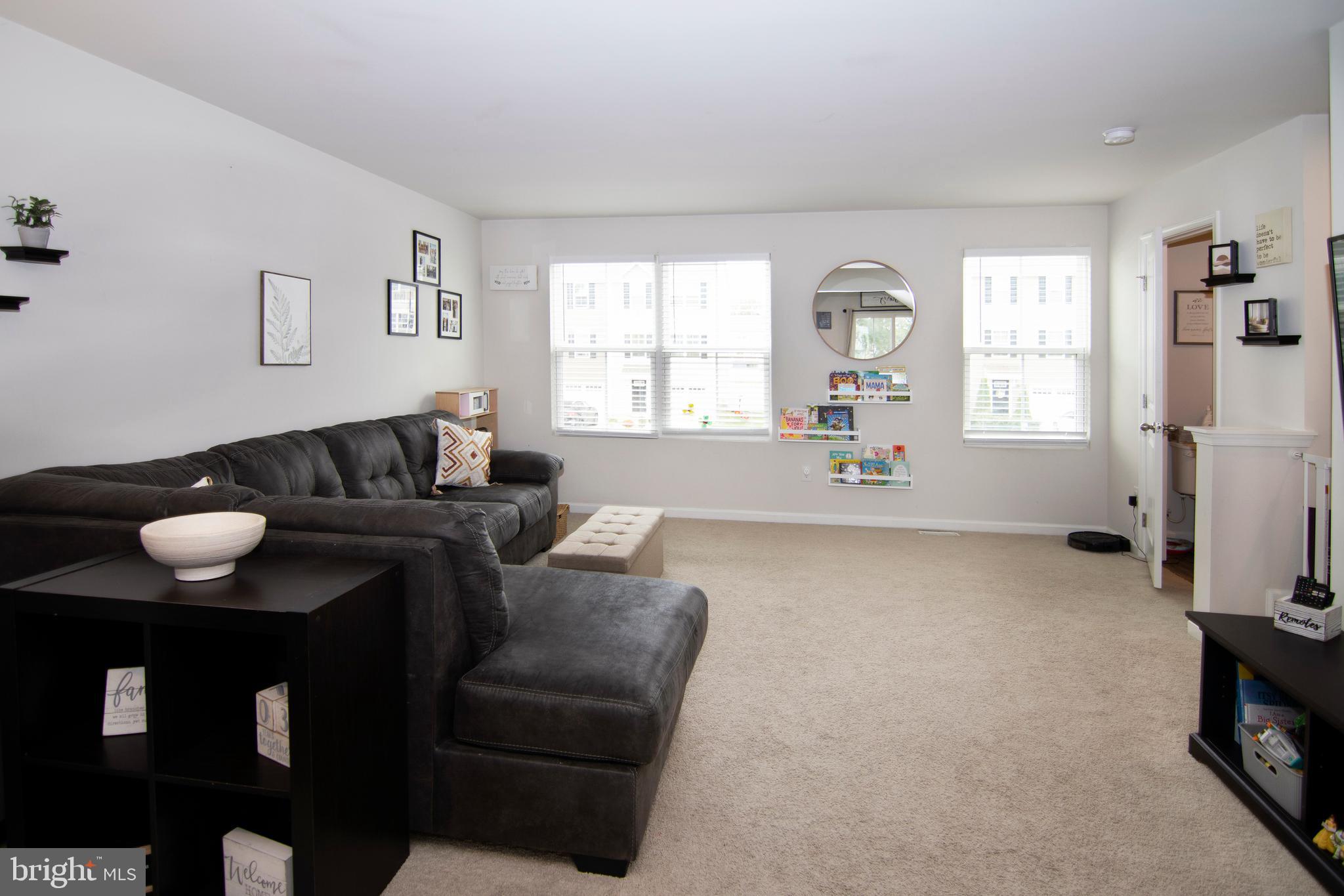 32 Burr Street Williamstown, NJ 08094 - Photo 5 of 34 a living room with furniture and wooden floor