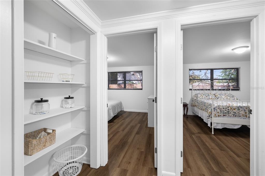 1220 East 142nd Avenue Tampa, FL 33613 - Photo 25 of 36 a en suite bathroom with a double vanity sink and a mirror