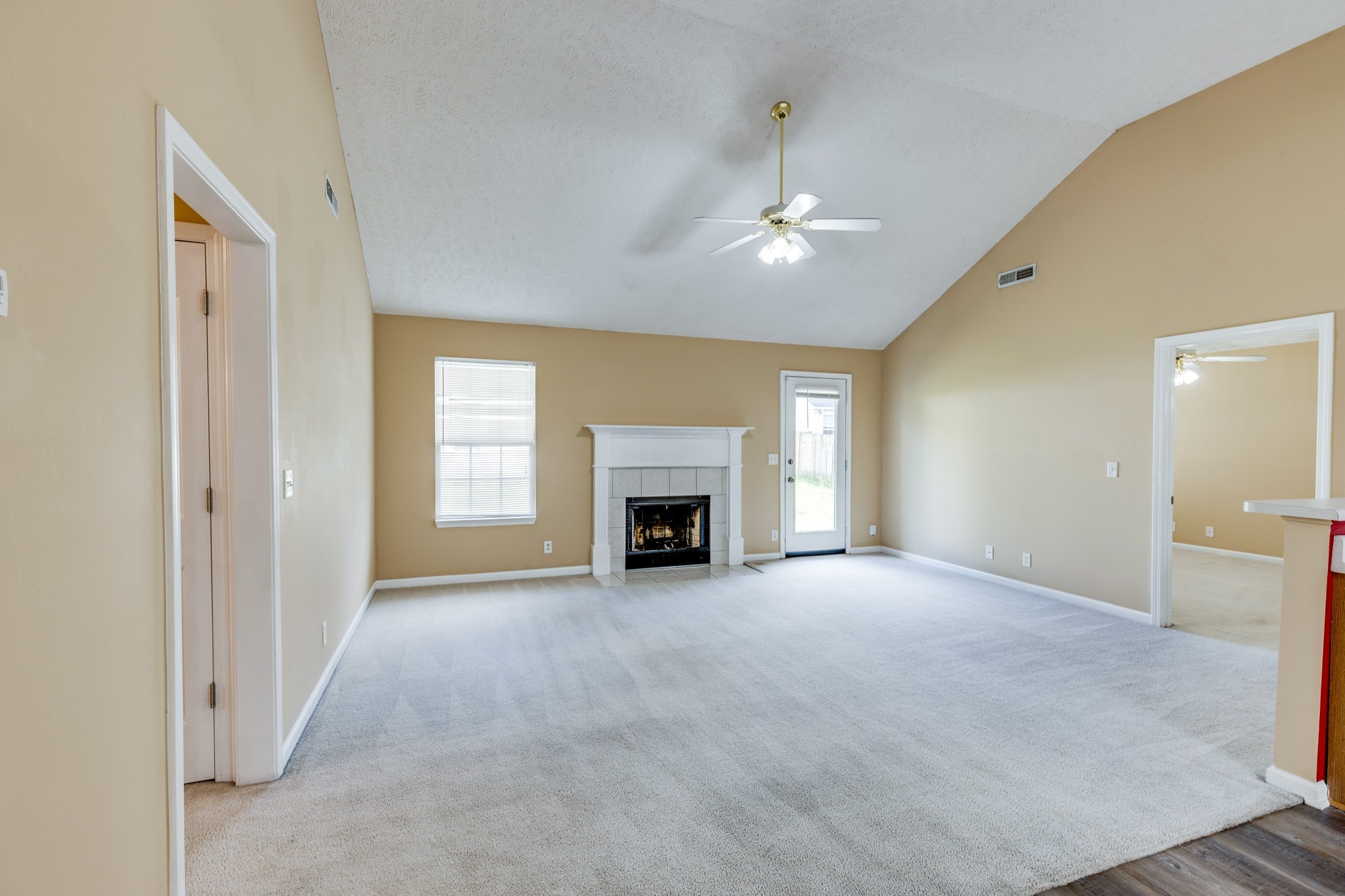 1418 Owasa Trail Murfreesboro, TN 37130 - Photo 18 of 23 a view of an empty room with a fireplace and a window