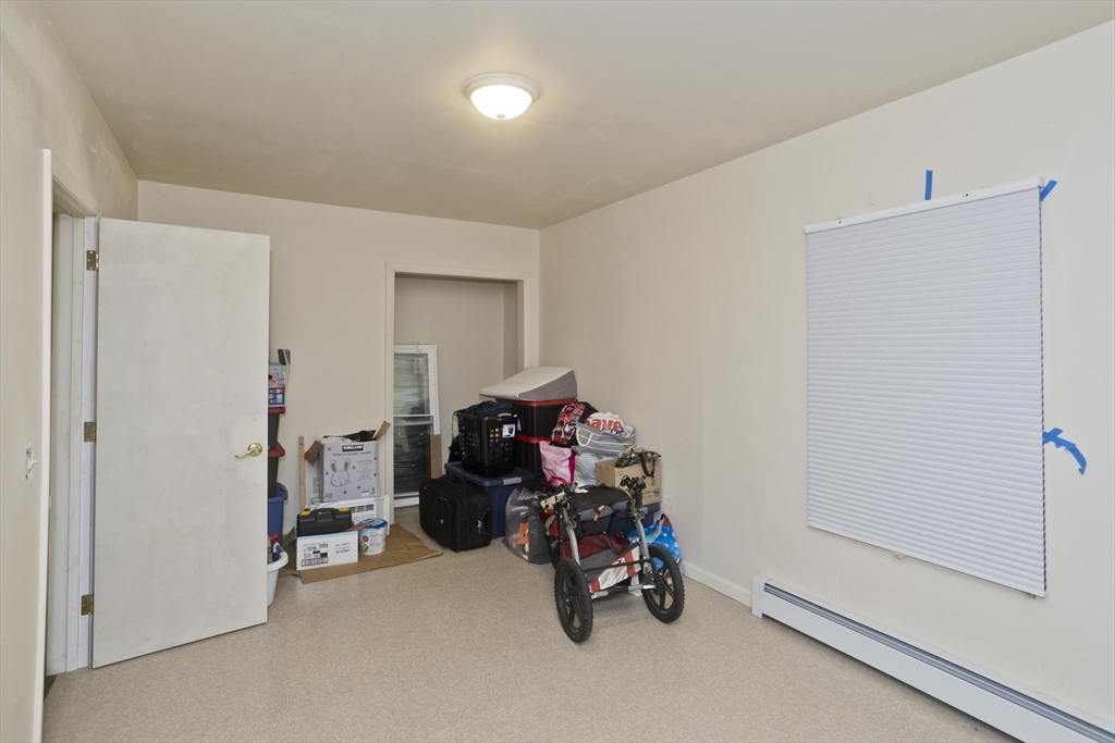 298 Oakland Street Springfield, MA 01108 - Photo 26 of 38 a view of a room with gym equipment