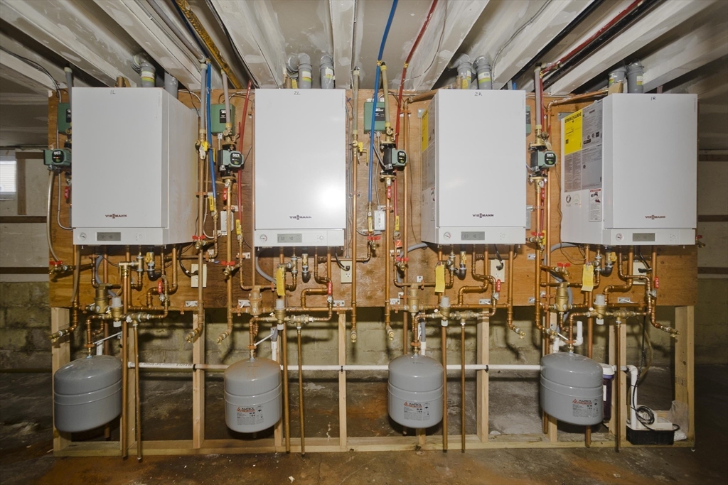 298 Oakland Street Springfield, MA 01108 - Photo 30 of 38 a view of water heater room