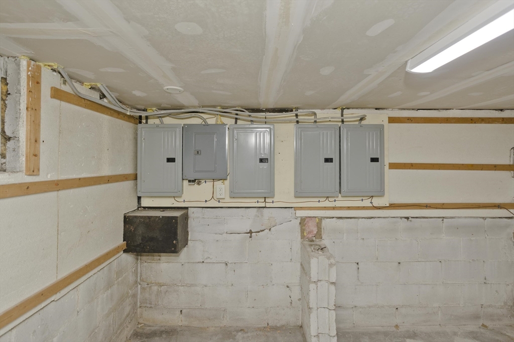 298 Oakland Street Springfield, MA 01108 - Photo 31 of 38 a bathroom with a shower and a tub