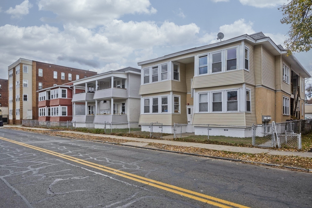 298 Oakland Street Springfield, MA 01108 - Photo 36 of 38 a front view of a building with a street