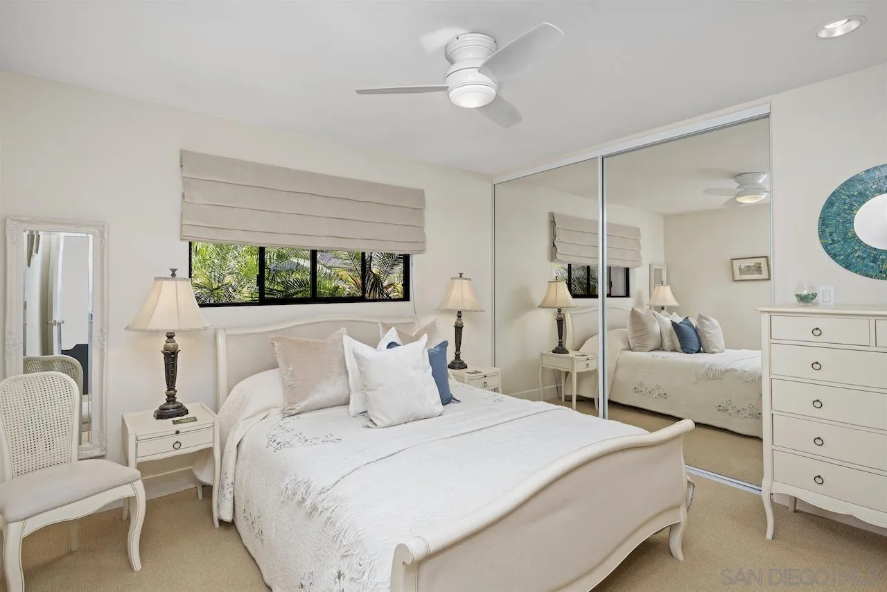 5510 Moonlight Lane La Jolla, CA 92037 - Photo 19 of 35 a bedroom with a bed and a dresser