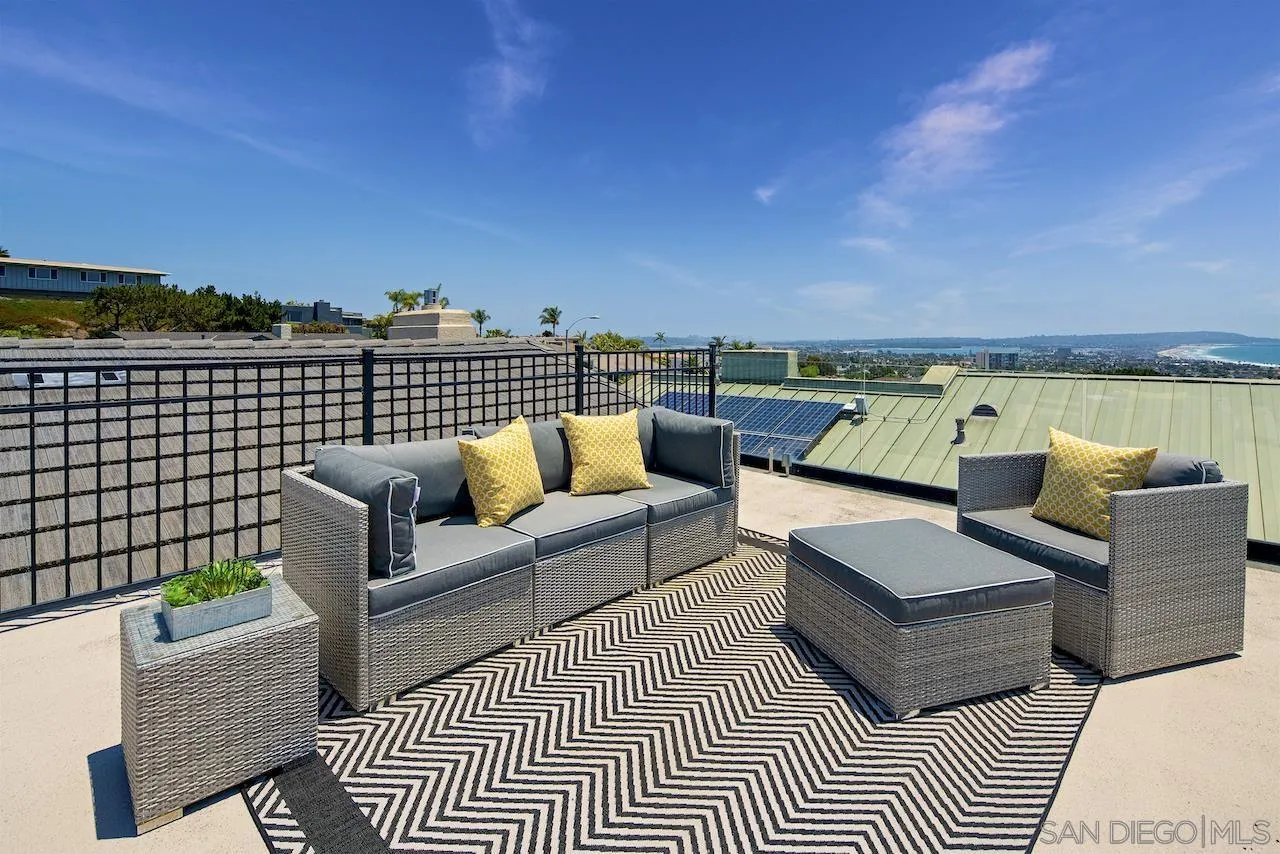 5510 Moonlight Lane La Jolla, CA 92037 - Photo 26 of 35 a balcony with furniture and city view