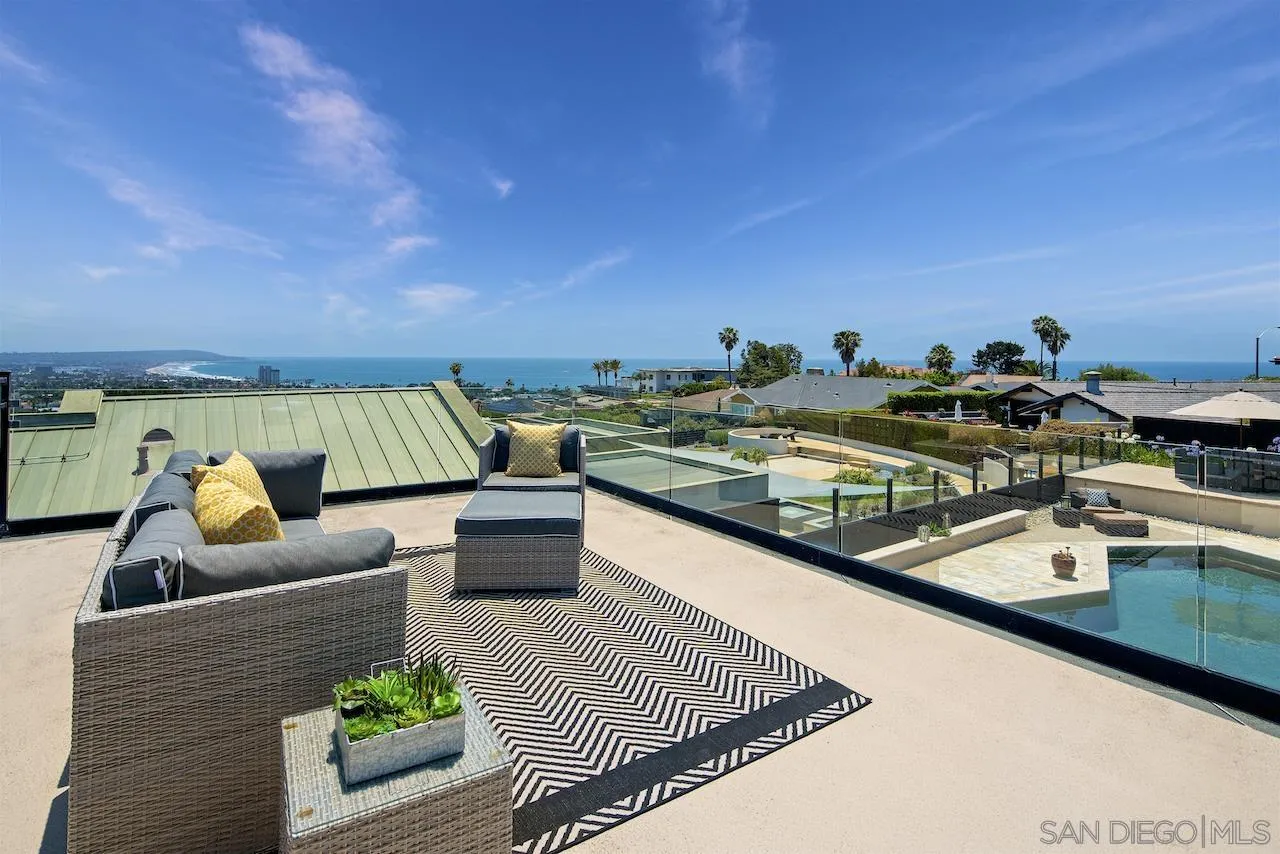 5510 Moonlight Lane La Jolla, CA 92037 - Photo 3 of 35 a view of swimming pool with seating space and seating area