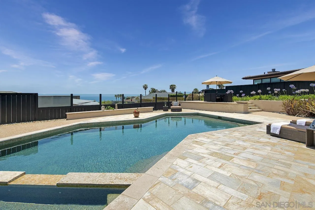 5510 Moonlight Lane La Jolla, CA 92037 - Photo 31 of 35 a view of a swimming pool with an outdoor seating