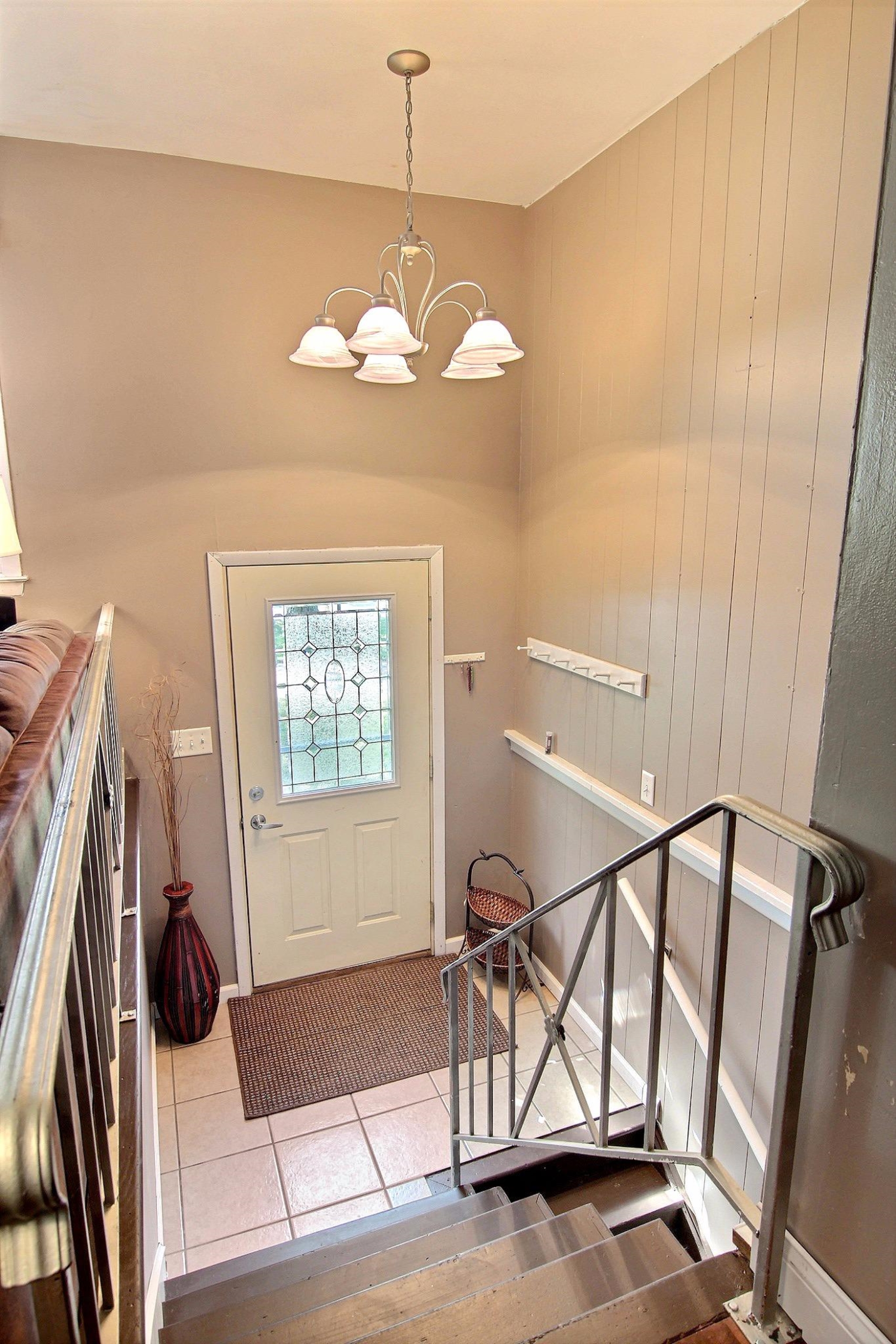 7829 Whitcomb Street Merrillville, IN 46410 - Photo 5 of 10 a view of entryway and hall with wooden floor