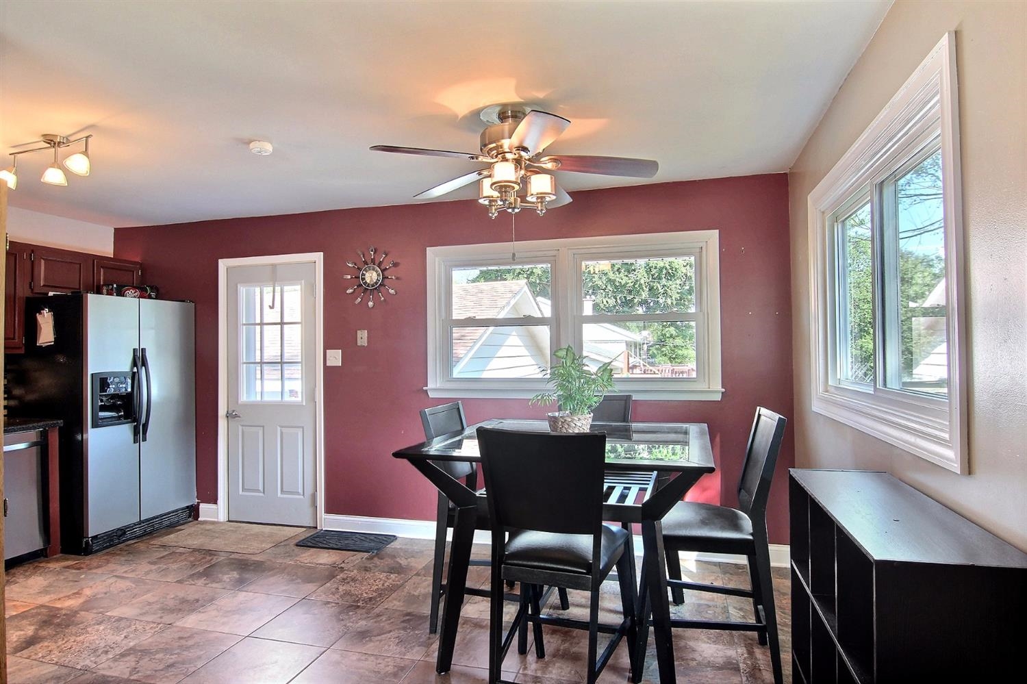7829 Whitcomb Street Merrillville, IN 46410 - Photo 6 of 10 a view of a dining room with furniture window and outside view