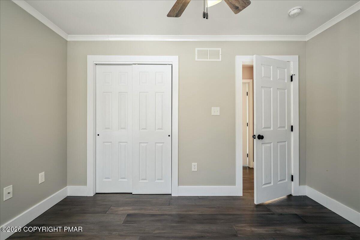 140 Alcott Lane Effort, PA 18330 - Photo 32 of 76 an empty room with wooden floor and closet