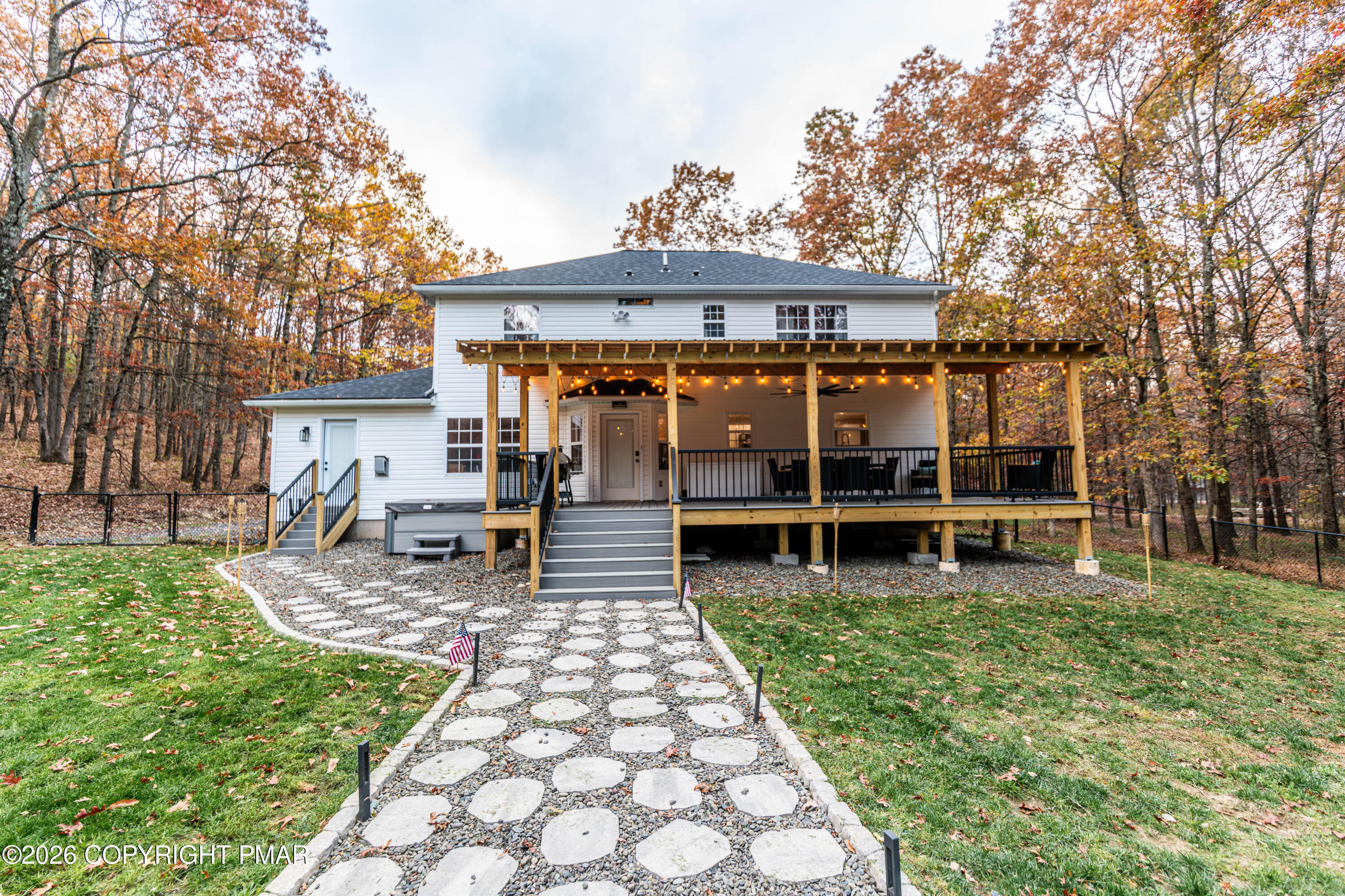 140 Alcott Lane Effort, PA 18330 - Photo 5 of 76 a view of a house with backyard porch and sitting area