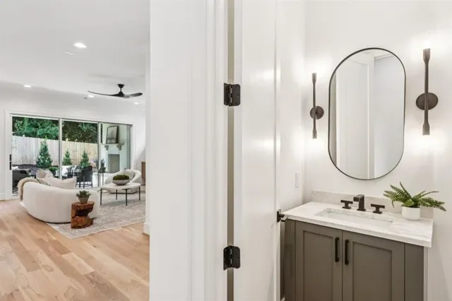 a bedroom with a bed and lamps